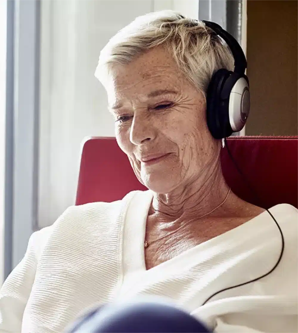 Onticon older woman taking online hearing test